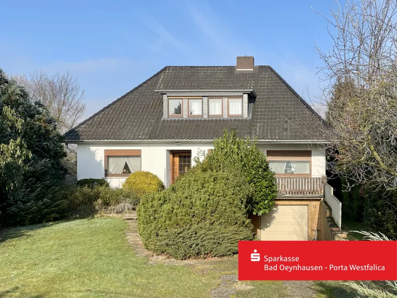 Hauptansicht - Haus kaufen in Porta Westfalica - Raumwunder mit Gartenidylle und Perspektive