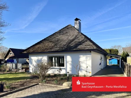 Hauptansicht - Haus kaufen in Bad Oeynhausen - Geräumiger Bungalow mit Einliegerwohnung in ruhiger Lage