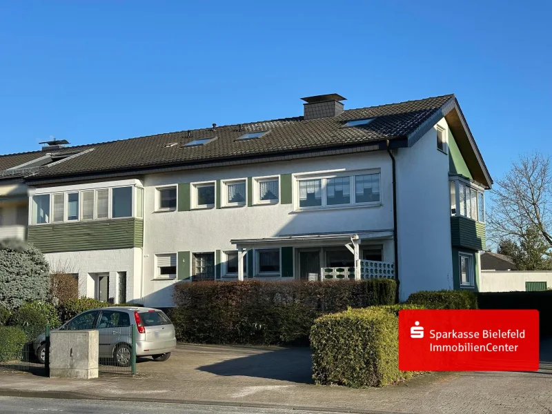  - Haus kaufen in Bielefeld - Attraktives Mehrfamilienhaus mit Gewerbeeinheit in Jöllenbeck