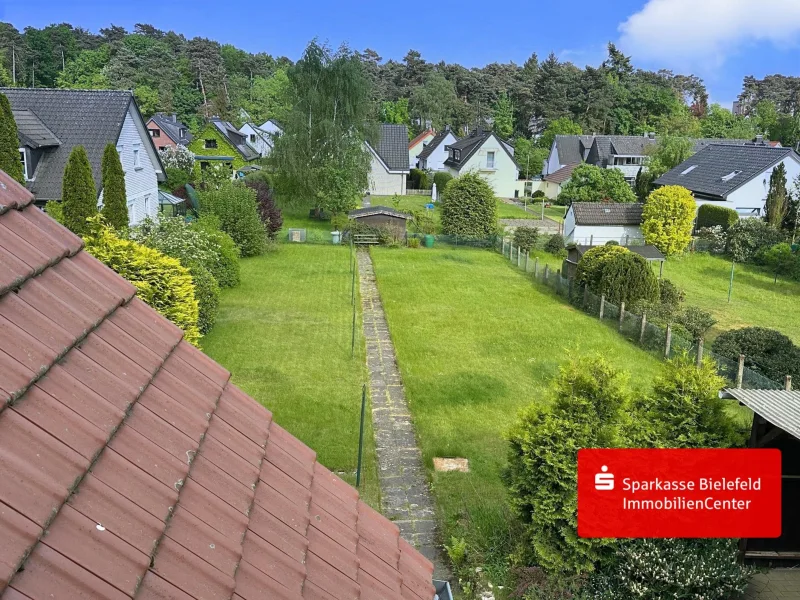  - Grundstück kaufen in Bielefeld - Großes Baugrundstück mit Einfamilienhaus in der beliebten Senne