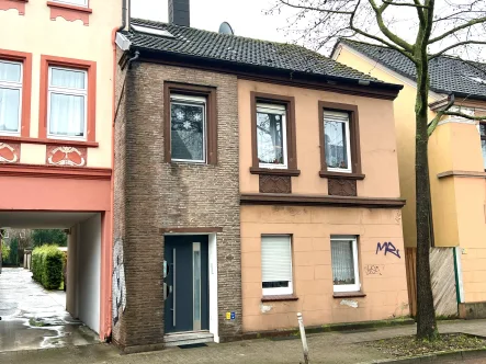 Straßenansicht - Haus kaufen in Dortmund - Solides Haus mit mehreren Varianten möglich