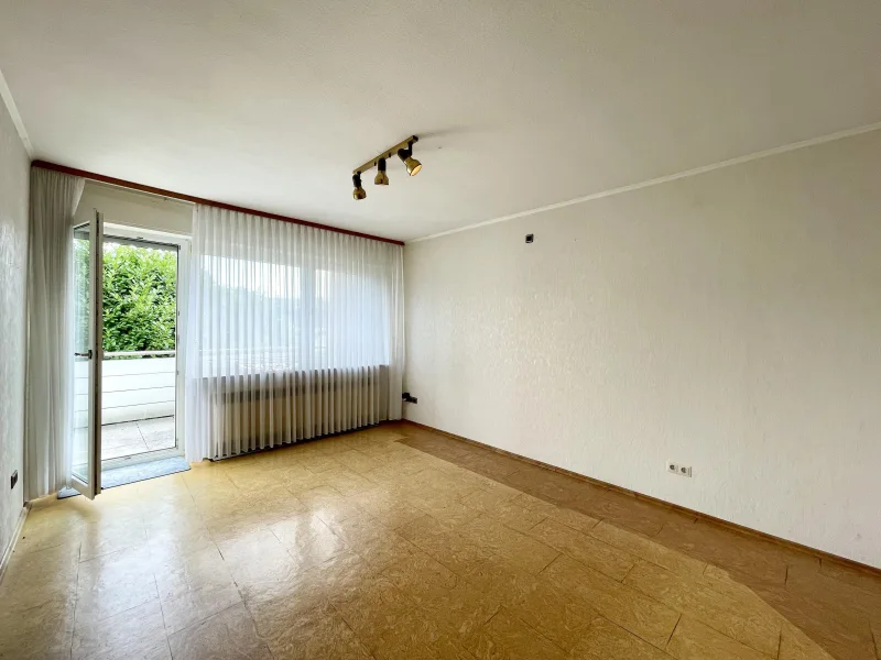 Elternschlafzimmer mit Zugang zum Balkon