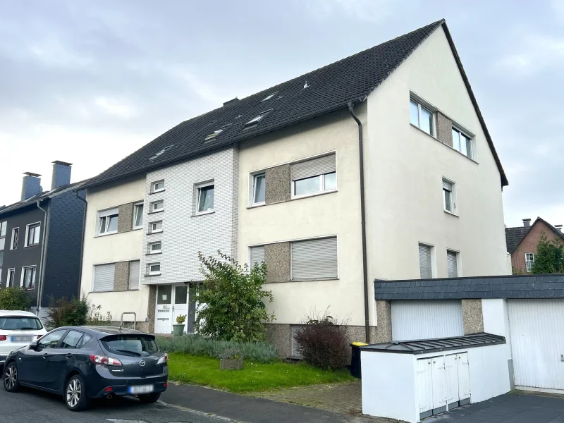 Hausansicht - Haus kaufen in Dortmund - Gepflegtes Mehrfamilienhaus mit Potential