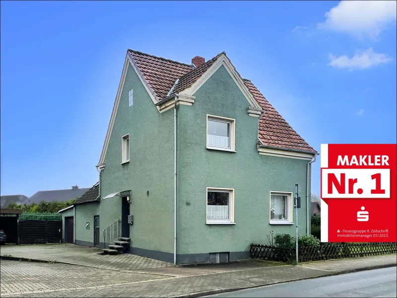 Außenansicht - Haus kaufen in Hamm - Ein-/Zweifamilienhaus auf großem Kaufgrundstück