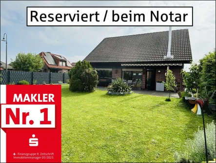 Traumhafter Garten samt Rückansicht vom Haus  - Haus kaufen in Hamm - Interessantes Fertighaus auf Erbpachtgrundstück mit idyllischem Garten in Braam-Ostwennemar