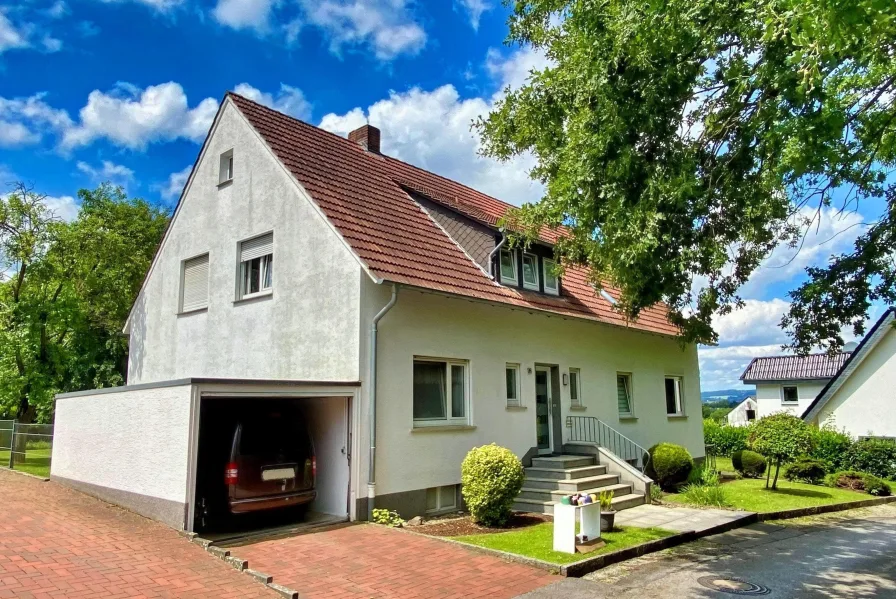 Außen1 - Haus kaufen in Kirchlengern - Charmantes Zweifamilienhaus im Grünen mit Wald- und Wiesenflächen