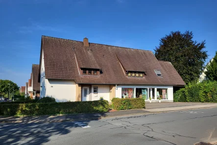 Hauptansicht - Haus kaufen in Hiddenhausen - Kooperation von Beruf und Privat in bester Wohnlage