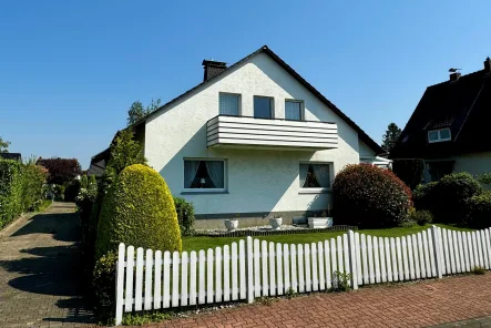 Straßenblick - Haus kaufen in Löhne - Einfamilienhaus in zentraler und ruhiger Lage