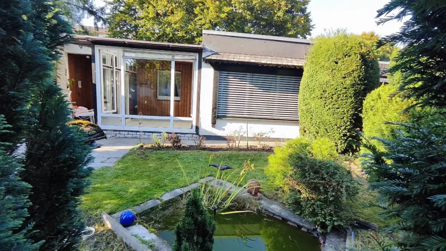 Blick vom Garten auf dieTterrasse - Haus kaufen in Oerlinghausen - Wohnen auf einer Ebene gefällig?