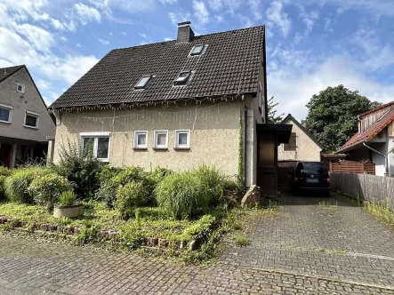 Straßenansicht - Haus kaufen in Dörentrup - Klein, fein, mein, günstig durch Erbpacht!