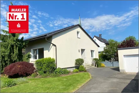 Vorder-/Seitenansicht - Haus kaufen in Werl - Kurzfristig verfügbar - Bungalow in ruhiger, zentraler Wohnlage