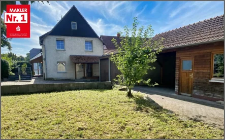 Gartenansicht / Gartenhaus - Carport / Garten - Haus kaufen in Soest - Soest - Ampen - ein Haus oder zwei Doppelhaushälften mit Platz zum Wohnen und fürs Hobby 