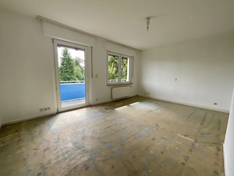 Schlafzimmer Obergeschoss mit Zugang zum Balkon