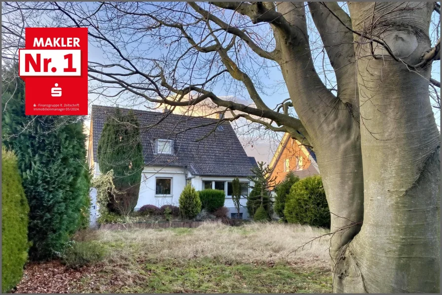 Gartenansicht - Haus kaufen in Soest - freistehendes Ein- / bzw. Zweifamilienhaus im Soester Norden auf einem rd. 784 m² großen Grundstück