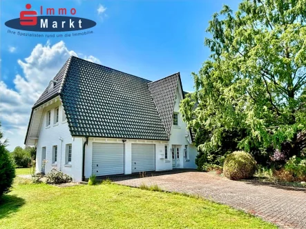 Exposétitelbild - Haus kaufen in Warmsen - Attraktives Landhaus mit viel Grün - Platz & Ruhe!