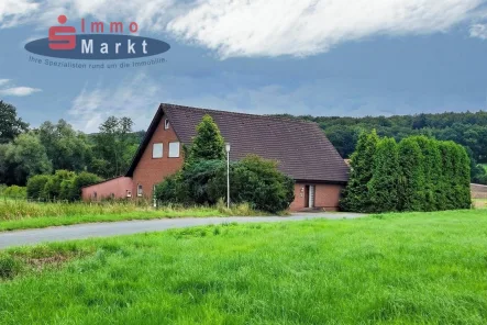 Nord-West-Ansicht - Haus kaufen in Preußisch Oldendorf - Naturnah Wohnen ohne direkte Nachbarn!