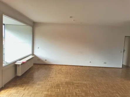 Wohnzimmer - Wohnung kaufen in Bochum - Vermietete Wohnung mit drei Zimmern und Balkon in Wattenscheid