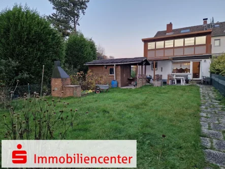 Titelbild - Haus kaufen in Recklinghausen - Gemütliches Einfamilien-Reihenendhaus mit großem Garten