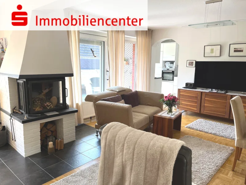 Wohnzimmer mit Kamin - Wohnung kaufen in Recklinghausen - Lassen Sie sich verzaubern! Eigentumswohnung mit Garage, RE Suderwicher-Heide