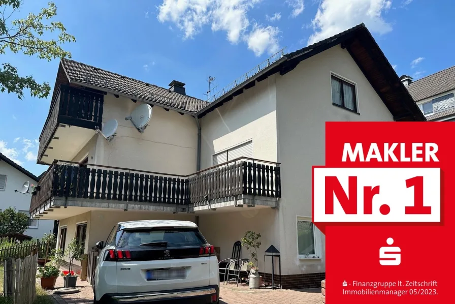 Straßenansicht - Wohnung kaufen in Bad Laasphe - Eigentumswohnung in ruhiger Lage mit Garage und Balkon in Bad Laasphe-Stadt