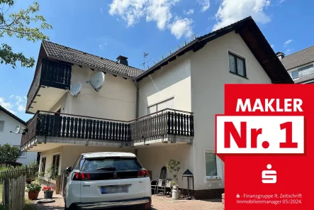 Straßenansicht - Wohnung kaufen in Bad Laasphe - Eigentumswohnung in ruhiger Lage mit Garage und Balkon in Bad Laasphe-Stadt