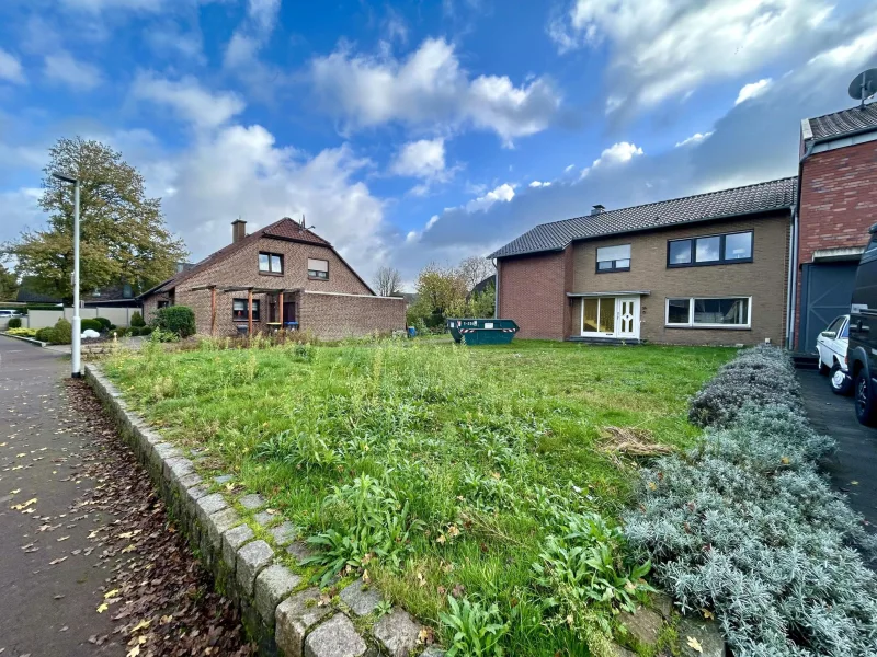 Straßenansicht  - Grundstück kaufen in Bocholt - Attraktives Baugrundstück inkl. Baugenehmigung für einen Bungalow mit Garten & Stellplatz