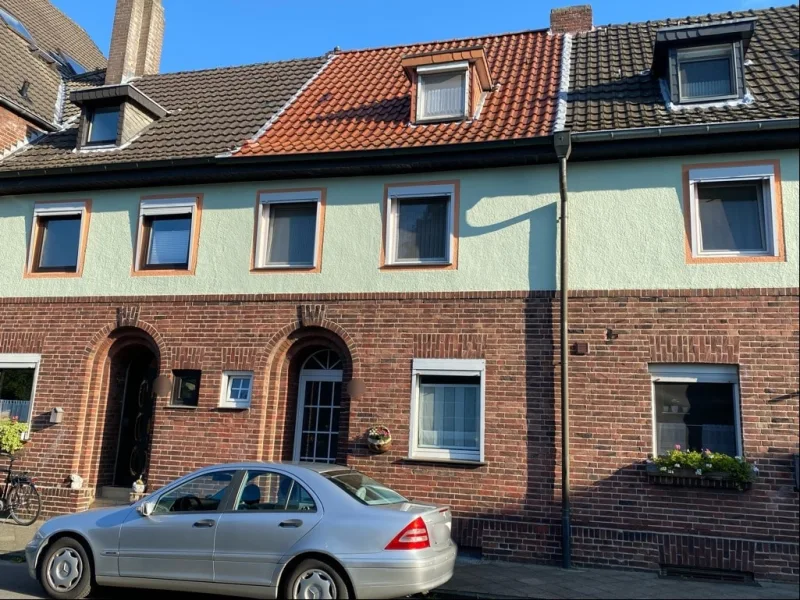 Straßenansicht - Haus kaufen in Bocholt - Reihenhaus mit Garten