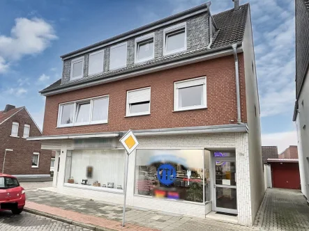 Straßenansicht - Haus kaufen in Rheine - 2 Ladenlokale und 2 große Wohnungen