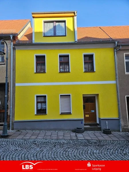 Vorderansicht - Haus kaufen in Oschatz - Attraktives Reihenhaus in Zentrumslage.