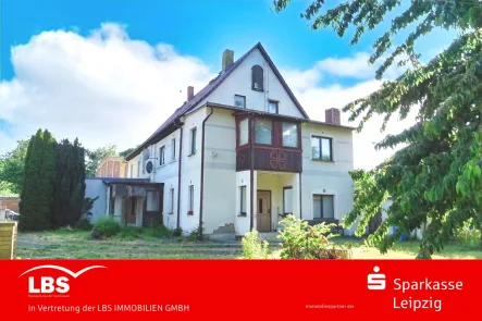 Ansicht - Haus kaufen in Krostitz - Doppelhaushälfte im Landhausstil