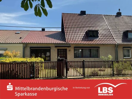  - Haus kaufen in Ludwigsfelde - Charmantes Reihenhaus auf großem Grundstück