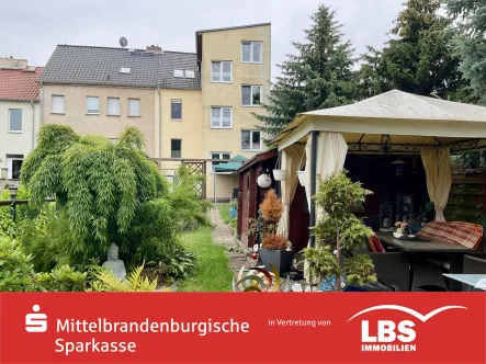  - Wohnung kaufen in Jüterbog - 3-Zi-Wohnung mit schönem Gartenanteil