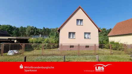 Straßenansicht - Haus kaufen in Hennigsdorf - Gemütliches Häuschen 