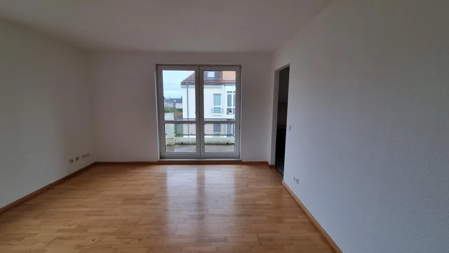 Wohnzimmer mit Balkon