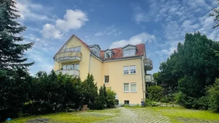 Hausansicht - Wohnung kaufen in Dresden - 2-Zimmer-Wohnung mit Garten in Klotzsche