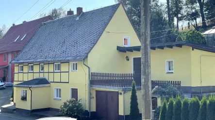 Ansicht - Haus kaufen in Hohnstein - Gepflegtes Fachwerkhaus mit Anbau