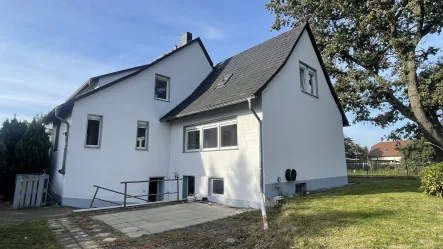 Doppelhaushälfte - Haus kaufen in Elsterheide - Doppelhaushälfte mit Einliegerwohnung