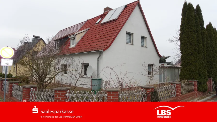 Straßenansicht - Haus kaufen in Mücheln - In ruhiger Siedlungslage!