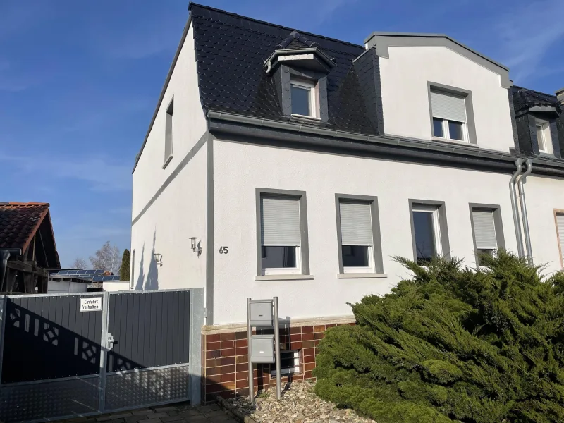 Frontansicht - Haus kaufen in Schönebeck - saniertes Einfamilienhaus zur Eigennutzung