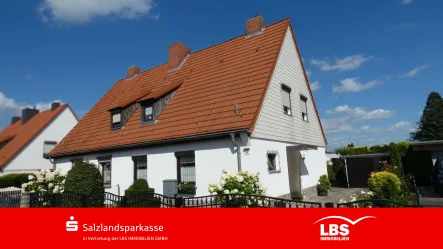 Hausansicht - Haus kaufen in Staßfurt - Wohnen in attraktiver Lage!