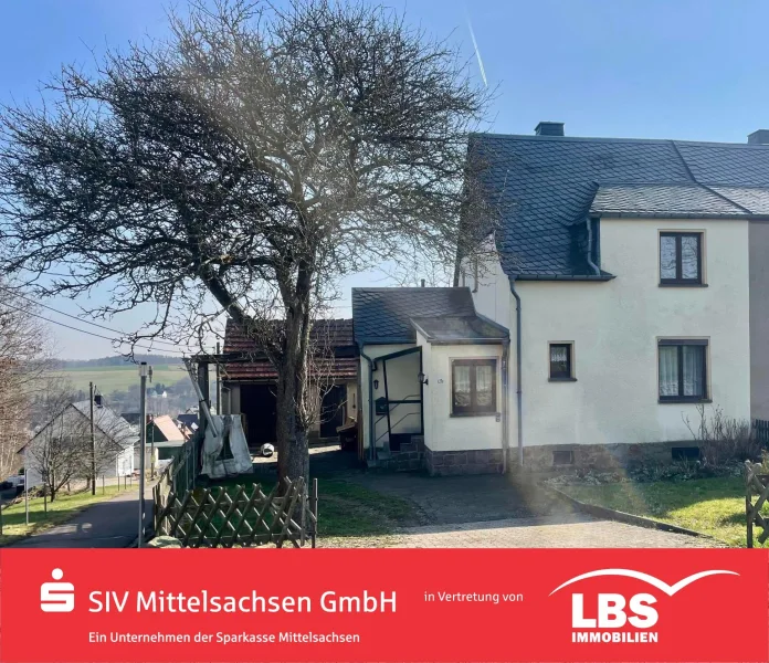 Straßenansicht - Haus kaufen in Lunzenau - Solide Doppelhaushälfte mit großem Grundstück 