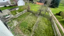 Blick vom Obergeschoss auf den Garten