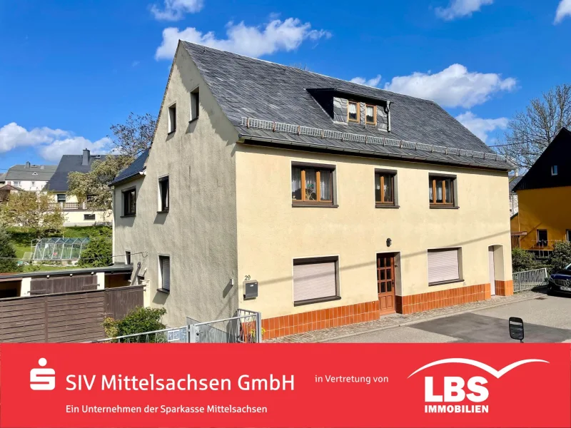 Außenansicht Straßenseite - Haus kaufen in Claußnitz - Solides, geräumiges und vielseitig nutzbares Haus.