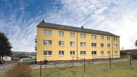 Ansicht Straßenseite - Wohnung kaufen in Krumhermersdorf - Kapitalanlage mit wunderbarem Fernblick 