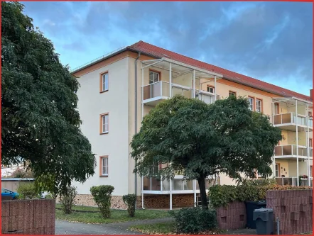 Gabäuderückansicht - Wohnung kaufen in Finsterwalde - Eigennutzung oder Kapitalanlage - Ihre Entscheidung