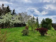 Garten mit Blick auf Felder und Wiesen