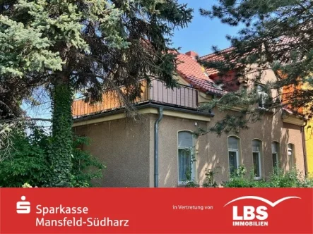 image2 - Haus kaufen in Lutherstadt Eisleben - Wohnhaus mit Balkon, zwei Garagen, großem Garten!