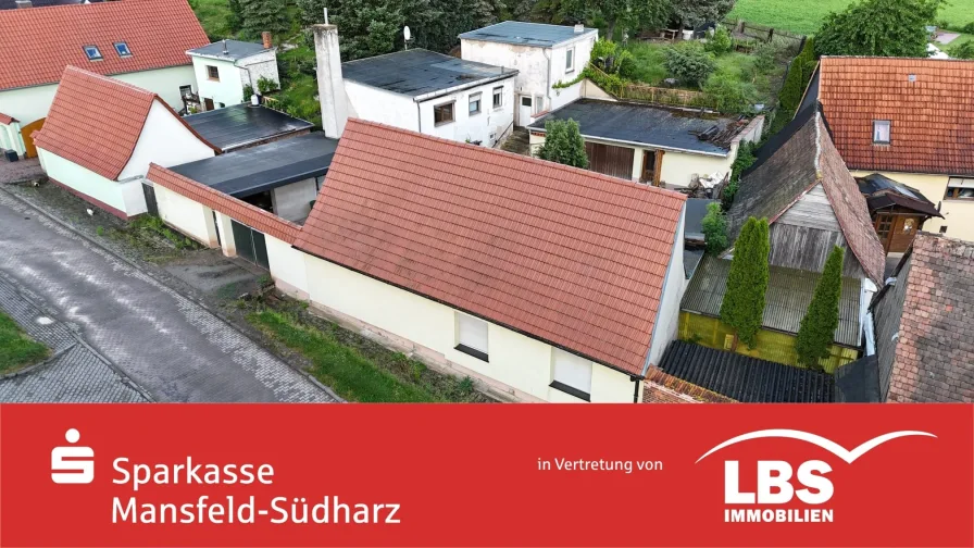  - Haus kaufen in Arnstein - Zum Wohnen mit Gewerbe und/oder Hobbys!