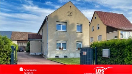 Straßenansicht - Haus kaufen in Thiendorf - Solides Eigenheim in ländlichem Umfeld