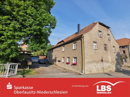 Straßenansicht - Haus kaufen in Niedercunnersdorf - Ein echt heißer Preis!